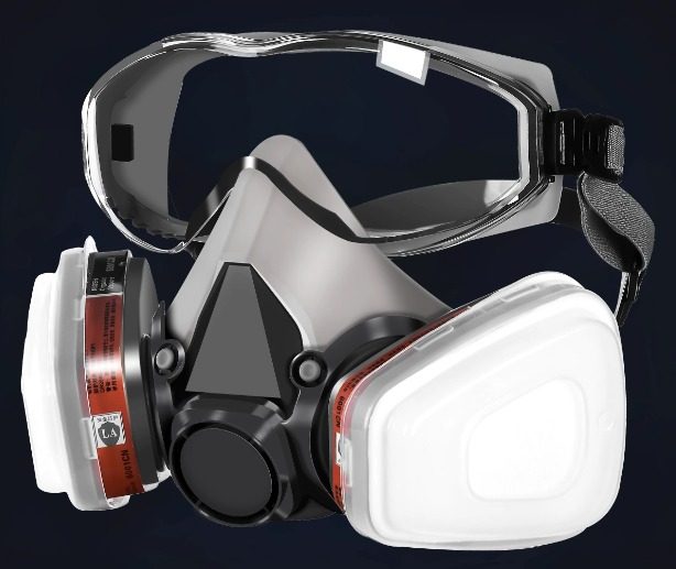 A silicone half-mask respirator with twin cartridges and sealed goggles